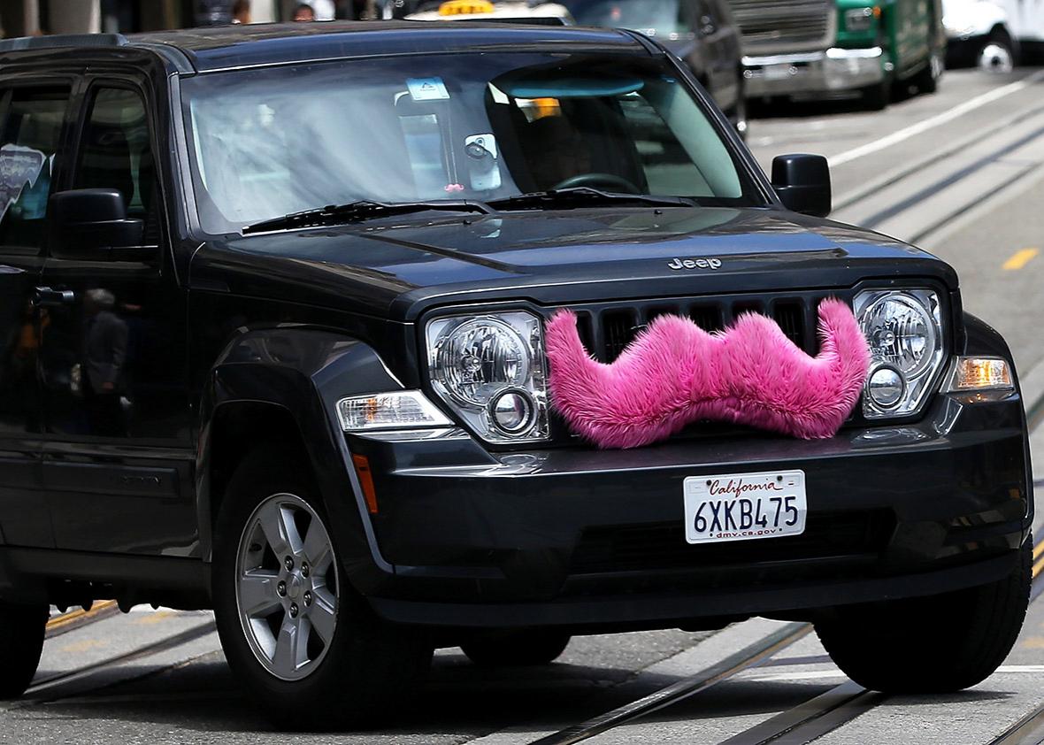A Lyft car drives along Powell Street on June 12, 2014 in San Francisco, California. 