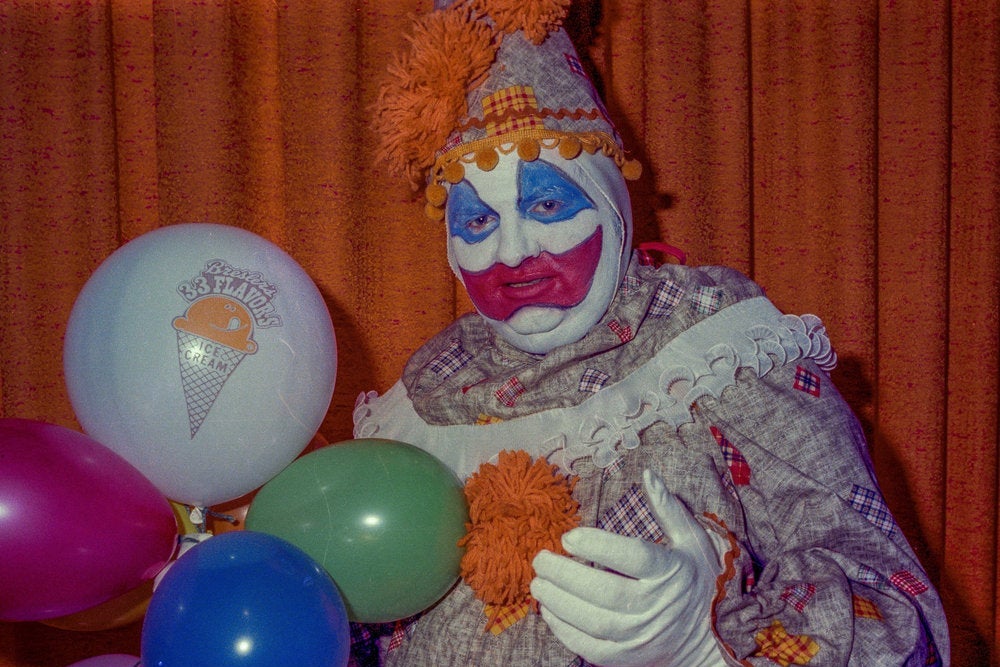 John Wayne Gacy, dressed as a clown.