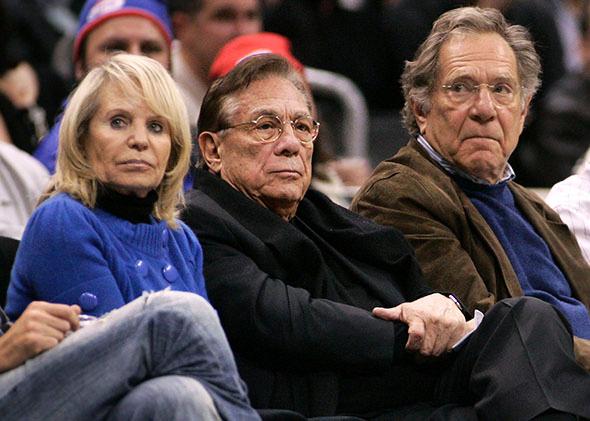 Los Angeles Clippers owner Donald Sterling (C), his wife Shelly (L) and actor George Segal.