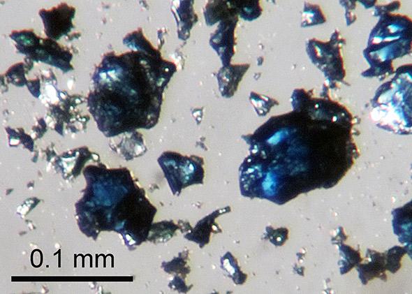Crystals of blue hydrous ringwoodite like these, synthesized in a high-pressure laboratory experiment, were used to help identify the diamond inclusion originating in the mantle transition zone.