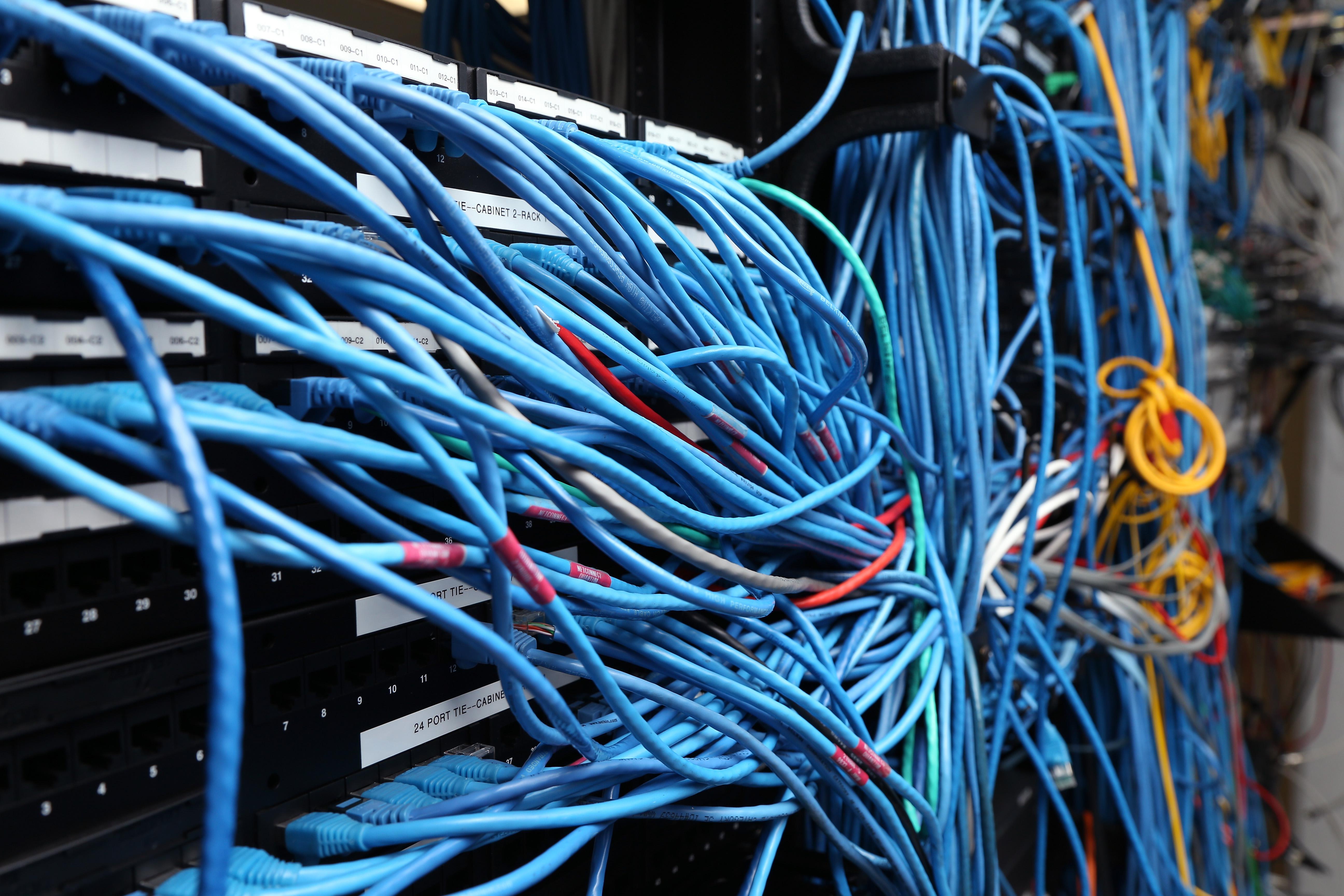 NEW YORK, NY - NOVEMBER 10:  Network cables are plugged in a server room on November 10, 2014 in New York City. U.S. President Barack Obama called on the Federal Communications Commission to implement a strict policy of net neutrality and to oppose content providers in restricting bandwith to customers.  (Photo by Michael Bocchieri/Getty Images)
