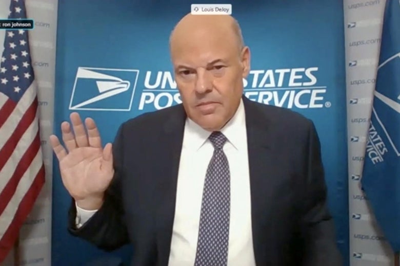 WASHINGTON, DC - AUGUST 21: In this screenshot from U.S. Senate's livestream, U.S. Postal Service Postmaster General Louis DeJoy is sworn in for a virtual Senate Homeland Security and Governmental Affairs Committee hearing on U.S. Postal Service operations during Covid-19 pandemic August 21, 2020 in Washington, DC.  The USPS is under financial and operational scrutiny ahead of the upcoming November presidential elections, where mail-in voting is set to play a large role given the Covid-19 pandemic.   (Photo by U.S. Senate Homeland Security and Governmental Affairs Committee via Getty Images)