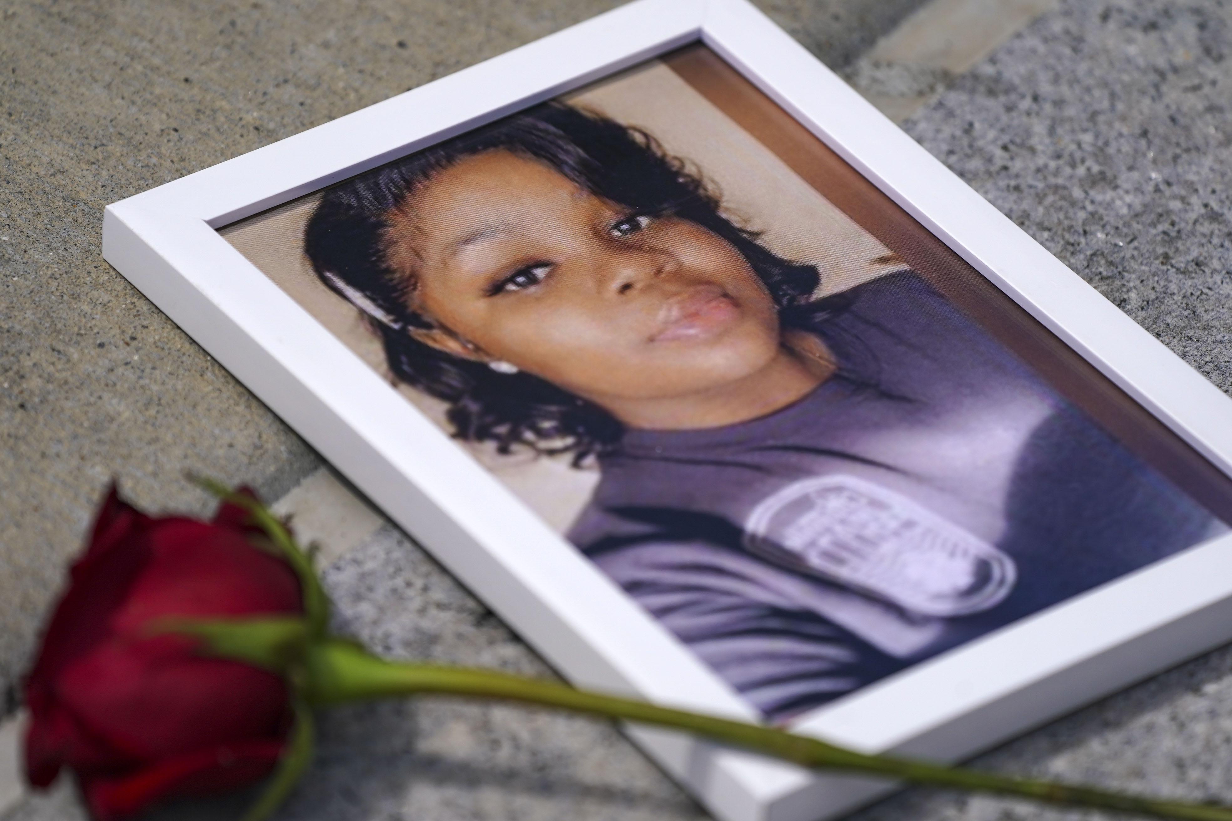 A photo of Breonna Taylor is seen among other photos of women who have lost their lives as a result of violence during the 2nd Annual Defend Black Women March in Black Lives Matter Plaza on July 30, 2022 in Washington, DC. 