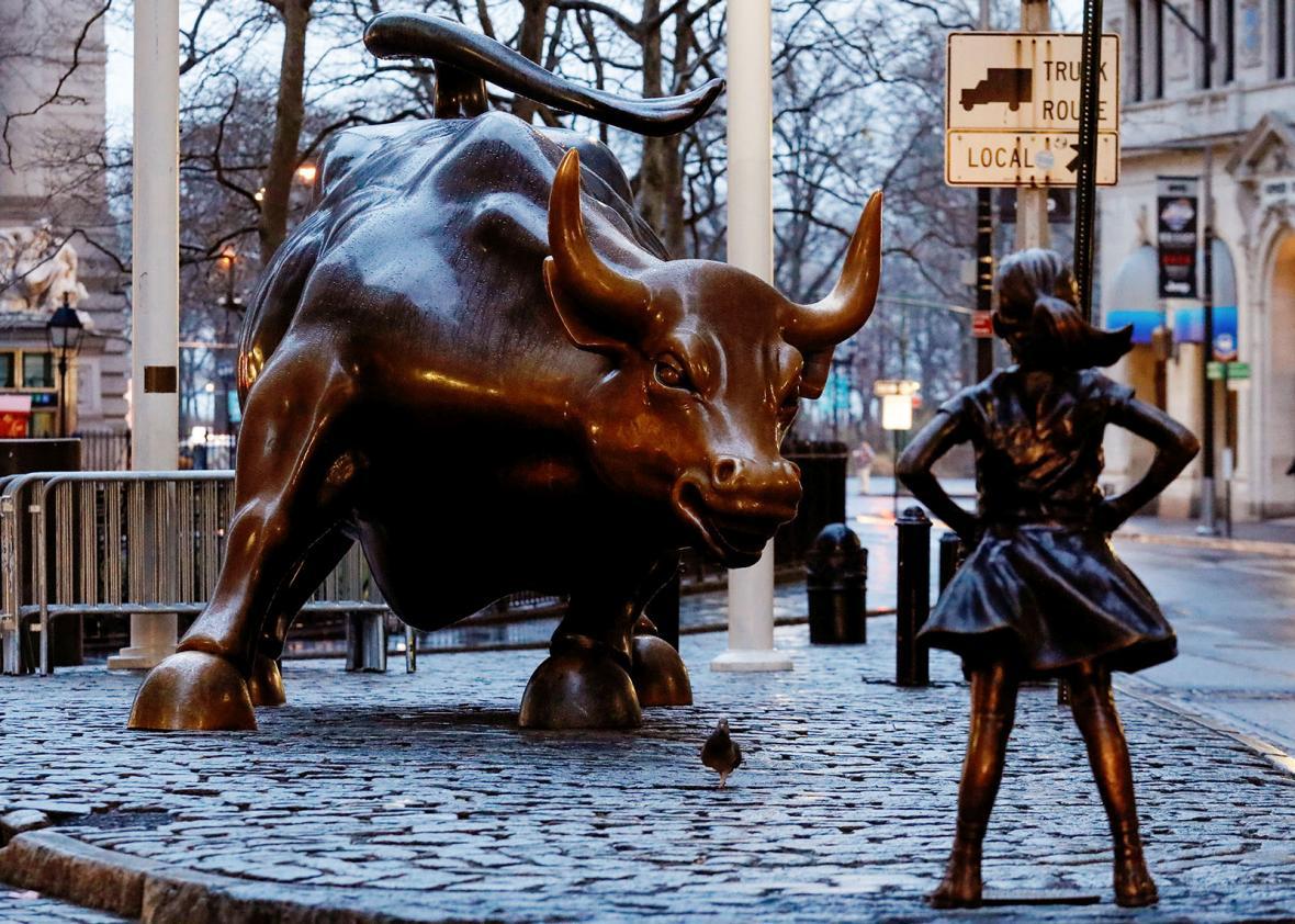 A bronze little girl sculpture joins the Charging Bull on Wall Street to  promote gender equity.
