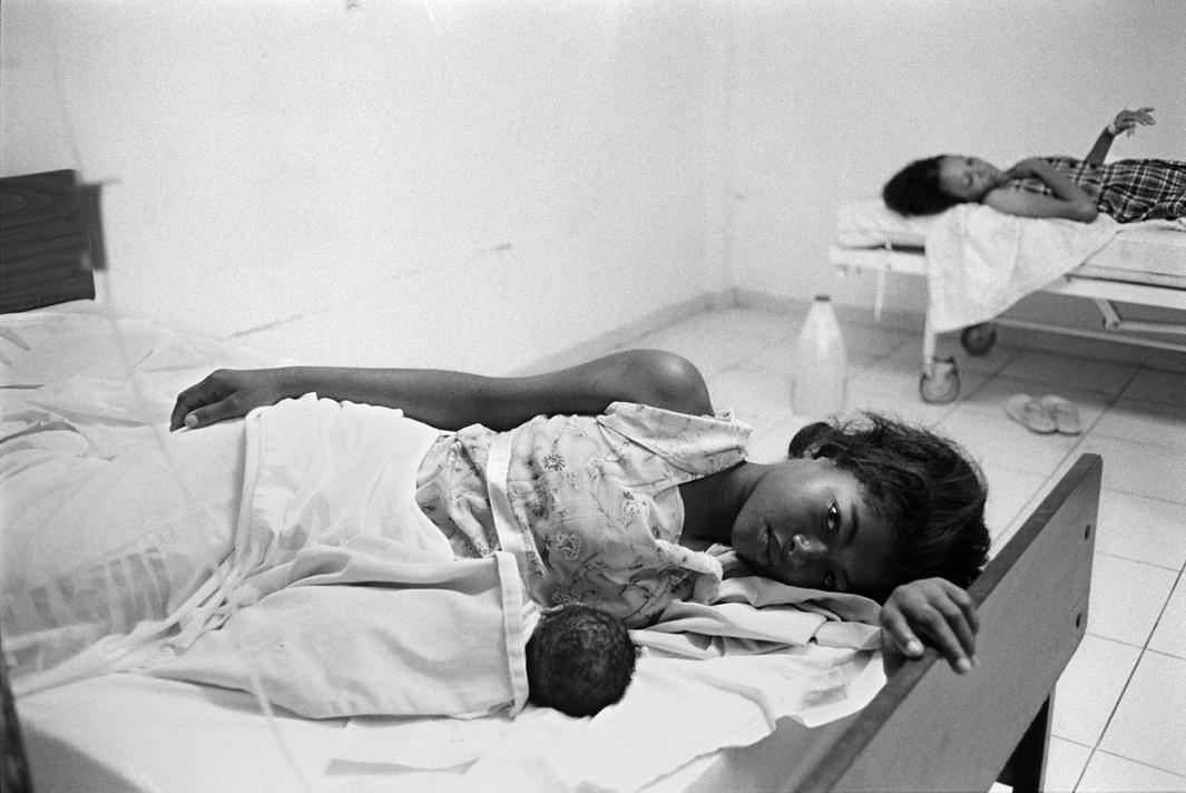 A patient with her newborn baby at the Juan Pablo Pina public hospital in San Cristóbal, Dominican Republic.