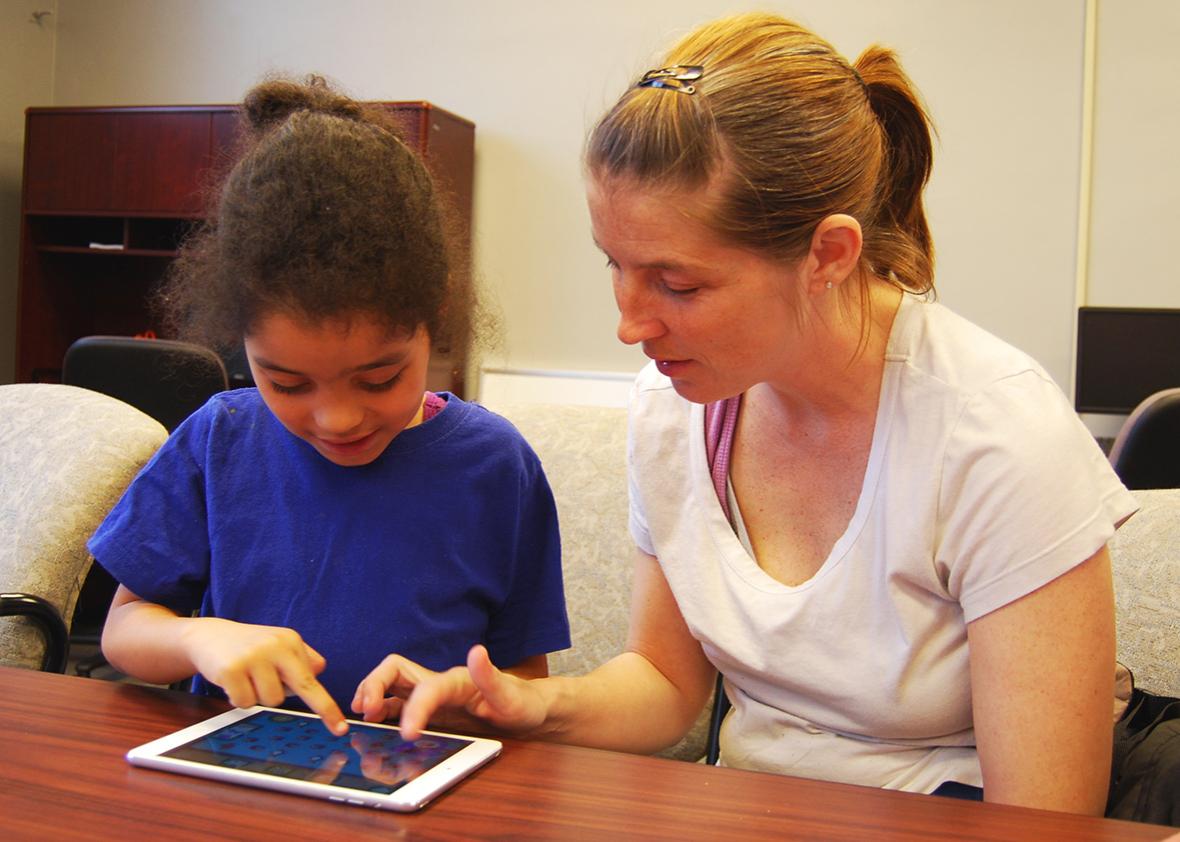 Jessica Green and her daughter, Ceriyanna Green-Ross, explore an educational app together during a Tech Goes Home early childhood course in Chattanooga, Tennessee. 