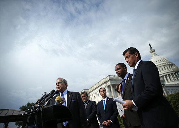 Rep. Rubén Hinojosa (D-TX) speaks as Rep. Juan Vargas (D-CA), Rep. Joaquin Castro (D-TX), Rep. Steven Horsford (D-NV), and Rep. Xavier Becerra.