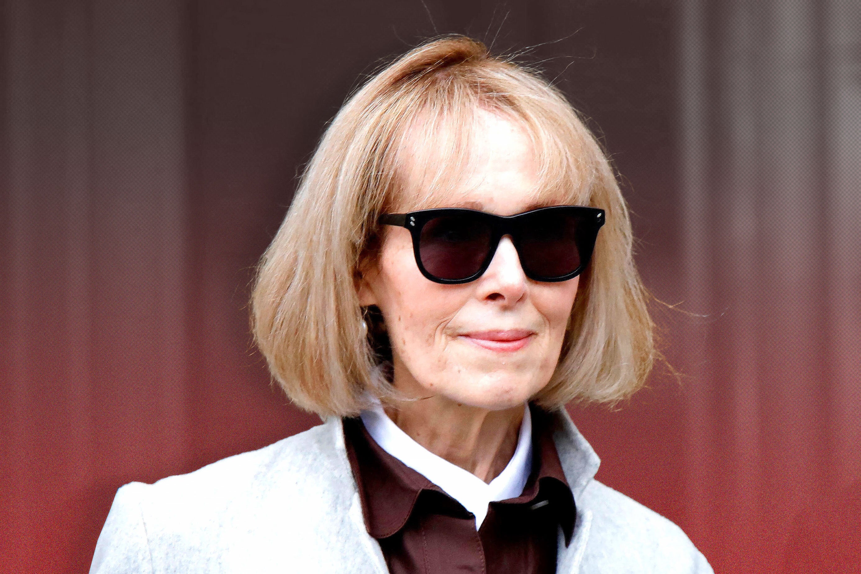 An image of E. Jean Carroll, wearing sunglasses.