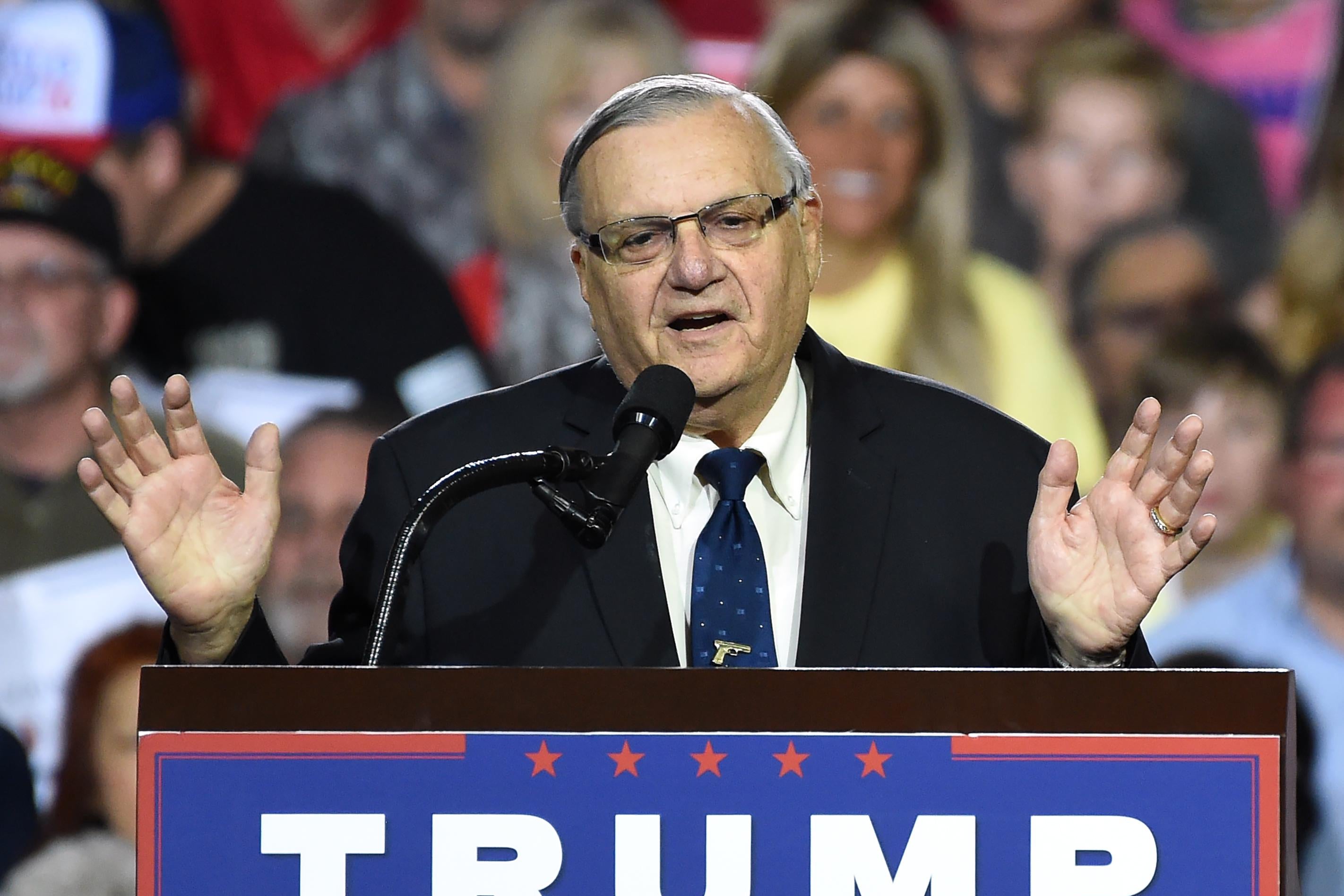 Sheriff Joe Arpaio attends a rally by Republican presidential candidate Donald Trump, October 4, 2016, in Prescott Valley, Arizona.
Arpaio will soon face criminal charges from federal prosecutors over his immigration patrols.  Federal prosecutors say they will charge Arpaio with contempt-of-court after he allegedly failed to obey a judges order to halt controversial immigration policies that some say include racial profiling.  / AFP / Robyn Beck        (Photo credit should read ROBYN BECK/AFP/Getty Images)
