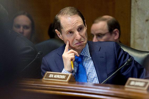 Committee Chairman Sen. Ron Wyden (D-OR) listens as members speak during a markup meeting of the Senate Energy and Natural Resources Committee March 21, 2013 in Washington, DC.
