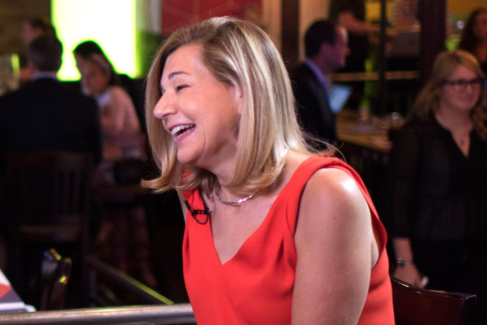 Margaret Sullivan laughs while seated at the Washington Post live space on  July 27, 2016. Photo by Jabin Botsford/The Washington Post via Getty Images.