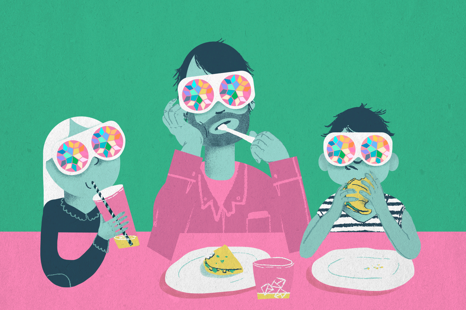 A man and two children wearing kaleidoscope glasses eat at a table.