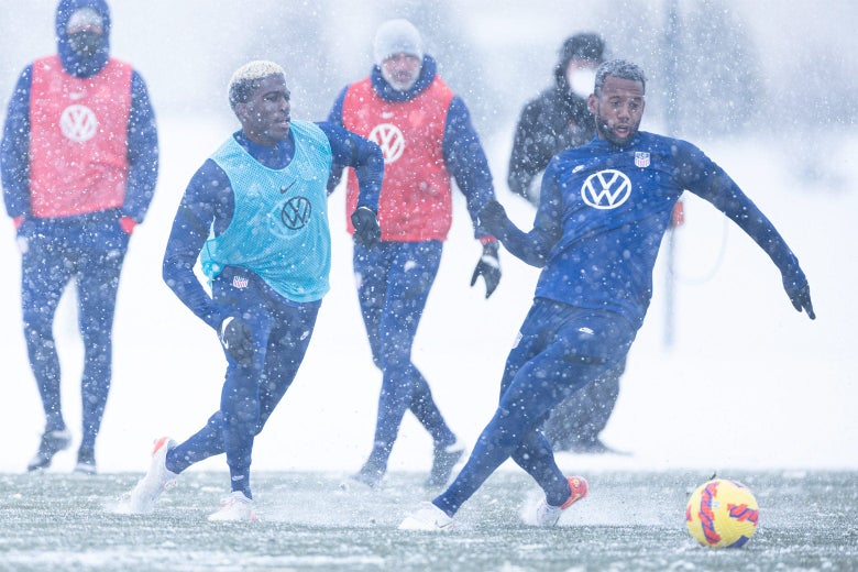 Gyasi Zardes, Kellyn Acosta play soccer in the snow.