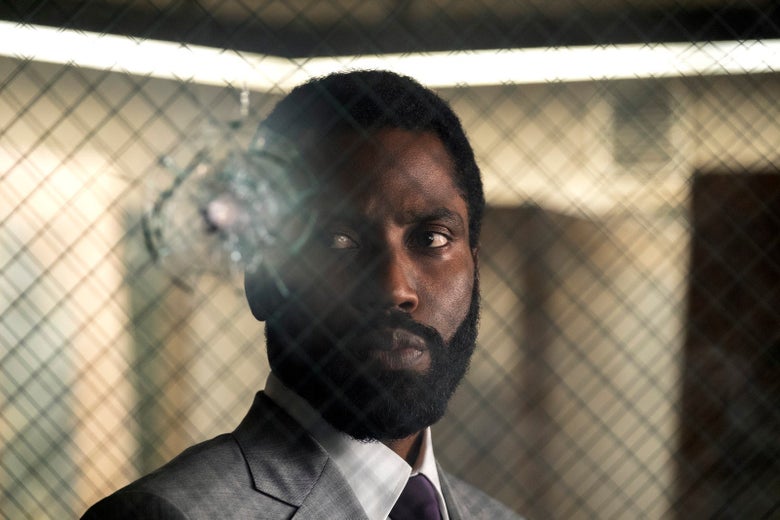 The actor side-eyes a bullet hole in a pane of glass