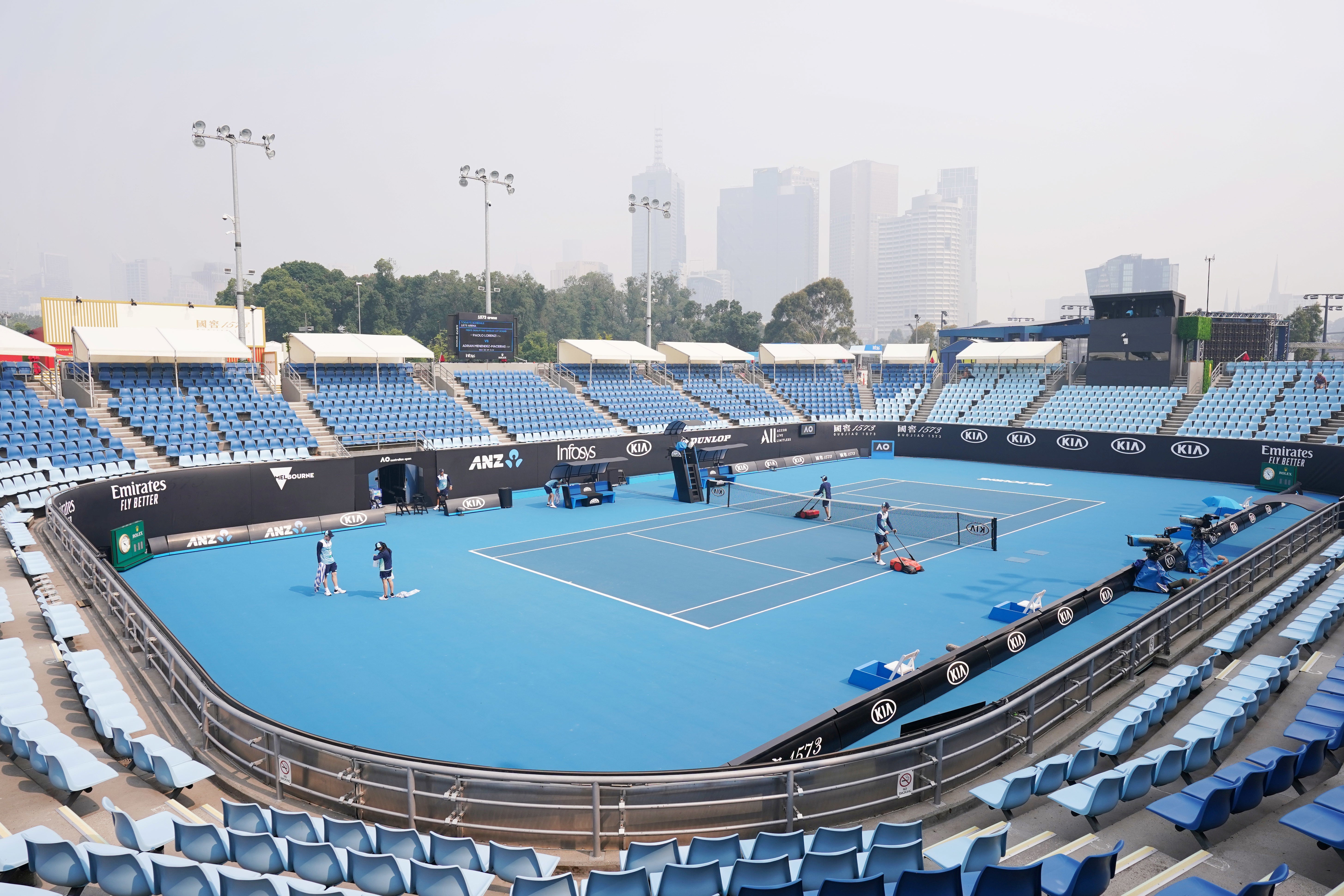 The city skyline shrouded by smoke haze from bushfires during an Australian Open practice session at Melbourne Park in Melbourne, Australia, Jan. 14, 2020. 