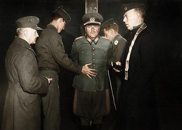 German General Anton Dostler is tied to a stake before his execution by a firing squad in the Aversa stockade, Italy, December 1945.