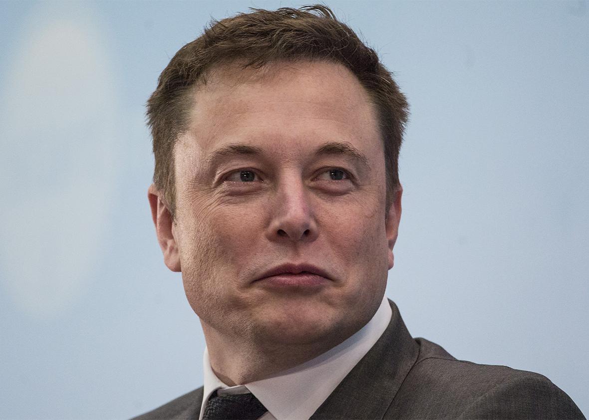 Billionaire Elon Musk, chief executive officer of Tesla Motors Inc., listens during the StartmeupHK Venture Forum in Hong Kong, China, on Tuesday, Jan. 26, 2016. 