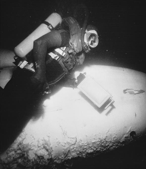 A Sealab II aquanaut does an underwater job during a two-week stay at the habitat in 1965 off the coast of San Diego, Calif.