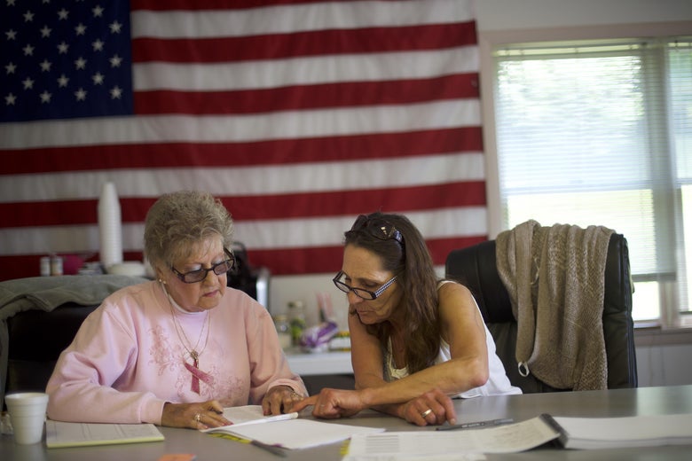 MOCANAQUA, PA - MAY 15:  Election officials (L-R) Barbara Kubasek and Darcie Lapinski confer at the Conyngham Township Municipal Building polling station during the 2018 Pennsylvania Primary Election on May 15, 2018 in Mocanaqua, Pennsylvania.  In the second major May primary day nationwide, four states go to the polls: Idaho, Nebraska, Oregon, and Pennsylvania.  (Photo by Mark Makela/Getty Images)