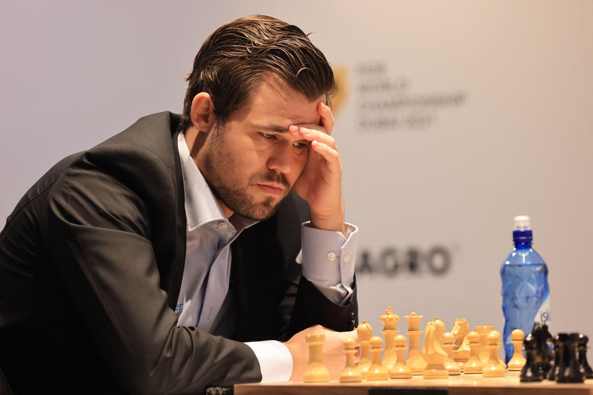 World chess champion Magnus Carlsen is in a losing position but
