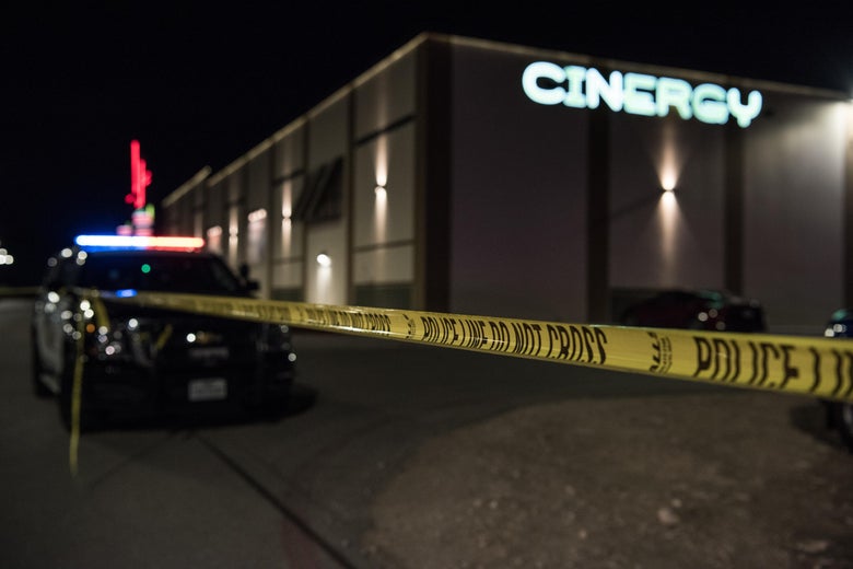 Police cars and tape block off a crime scene outside the Cinergy Odessa movie theater where a gunman was shot and killed on August 31, 2019 in Odessa, Texas. 