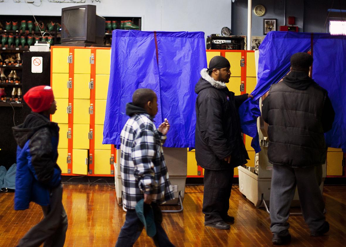 Residents cast their ballots at a polling place inside the Elmwood Roller Skating Rink on November 6, 2012 in Southwest Philadelphia, Pennsylvania. 