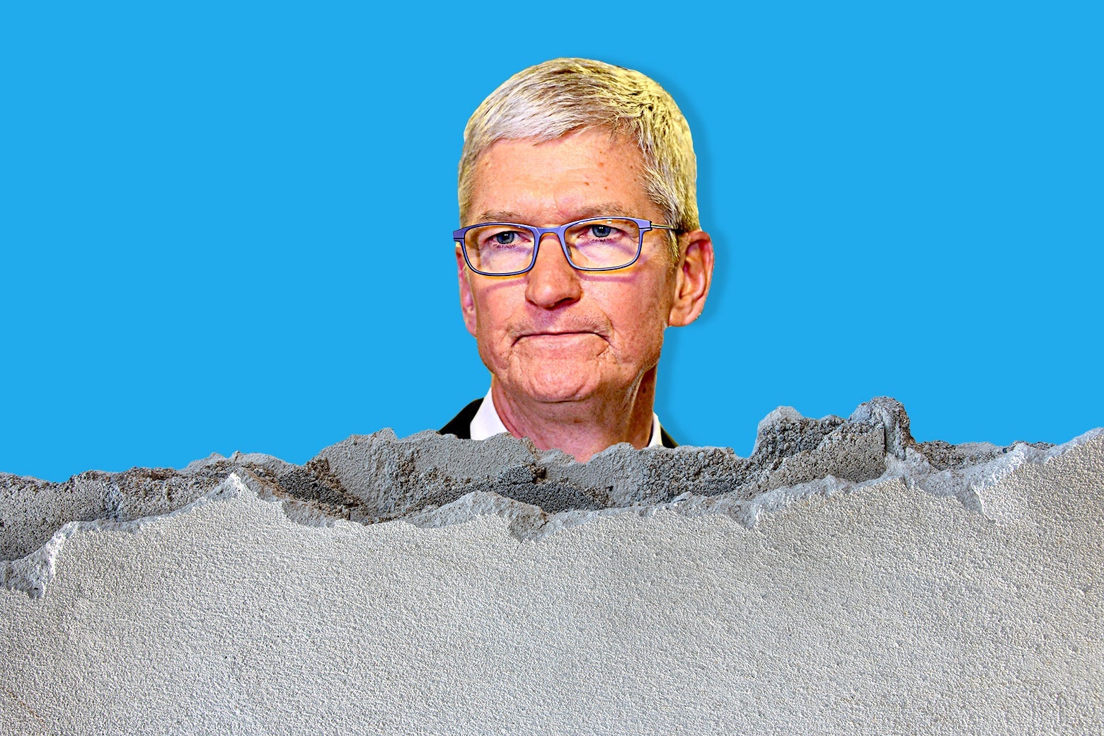 Tim Cook peering over a crumbling concrete wall.
