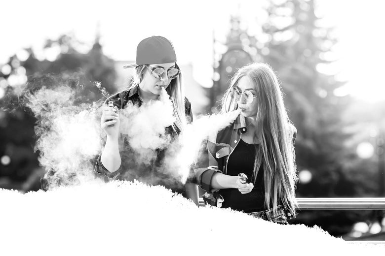 Two people wearing mirrored sunglasses and ripping huge vape clouds.