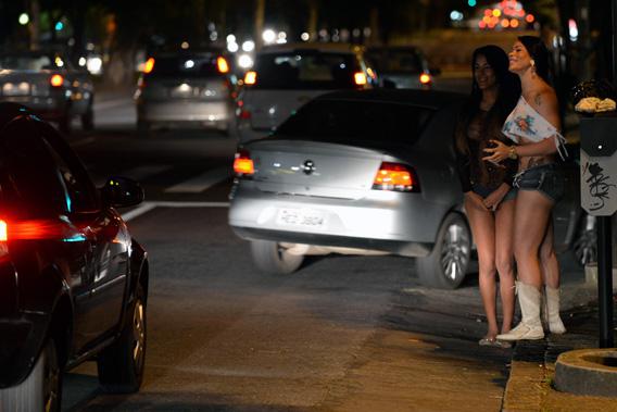 Prostitutes wait for clients in the streets on April 25, 2013.
