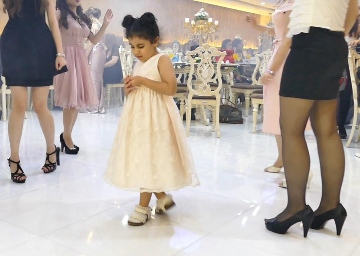 A little girl steals the show on the dance floor. Children can be photographed nearly as much as the bride at weddings.
