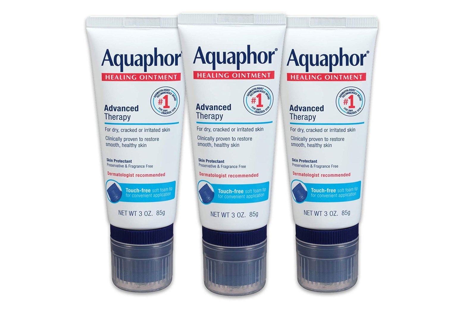 Three bottles of Aquaphor lotion.
