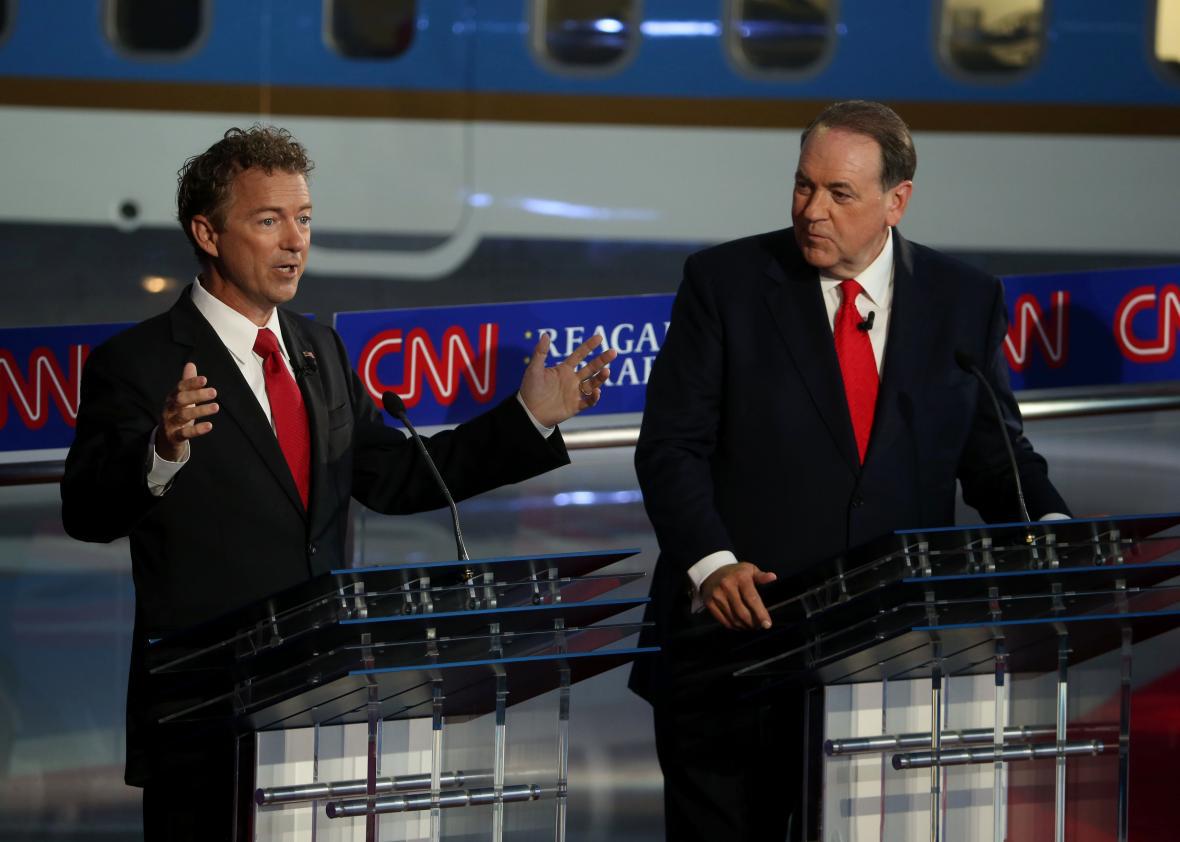 Rand Paul (R-KY) and Mike Huckabee take part in the presidential debates at the Reagan Library on September 16, 2015 in Simi Valley, California