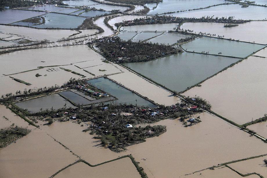 An aerial view shows flooded rice fields after Typhoon Haiyan hit Iloilo Province, central Philippines November 9, 2013. One of the strongest typhoons ever to make landfall devastated central Philippines.