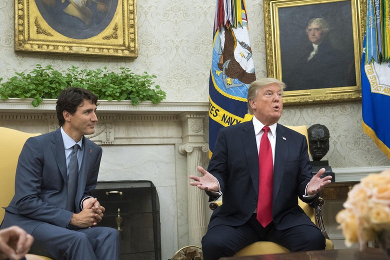 Canadian Prime Minister Trudeau and U.S. President Trump sitting and talking in the Oval Office.