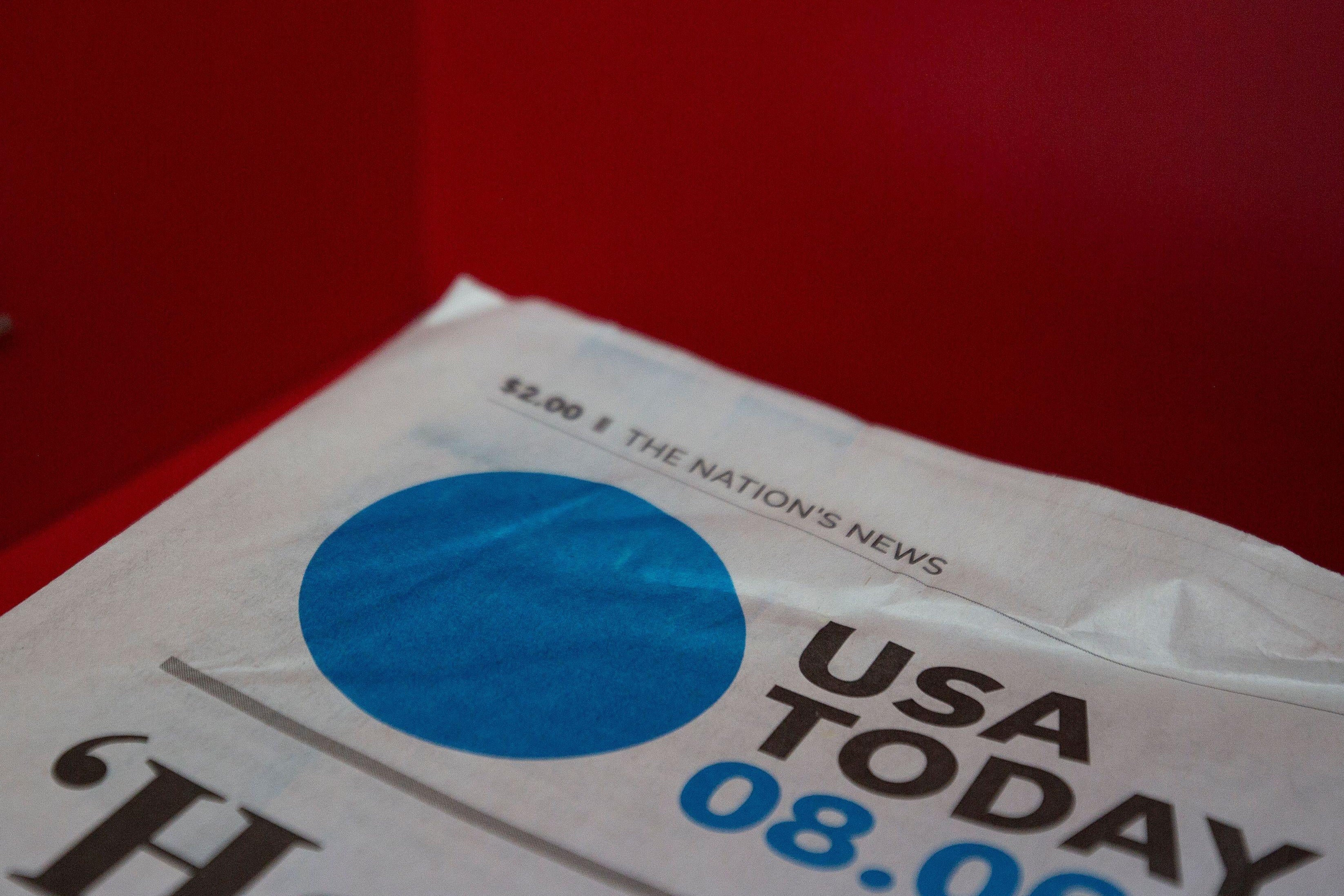 The front page of a USA Today newspaper is seen at a convenience store in Washington, DC, on August 6, 2019. 