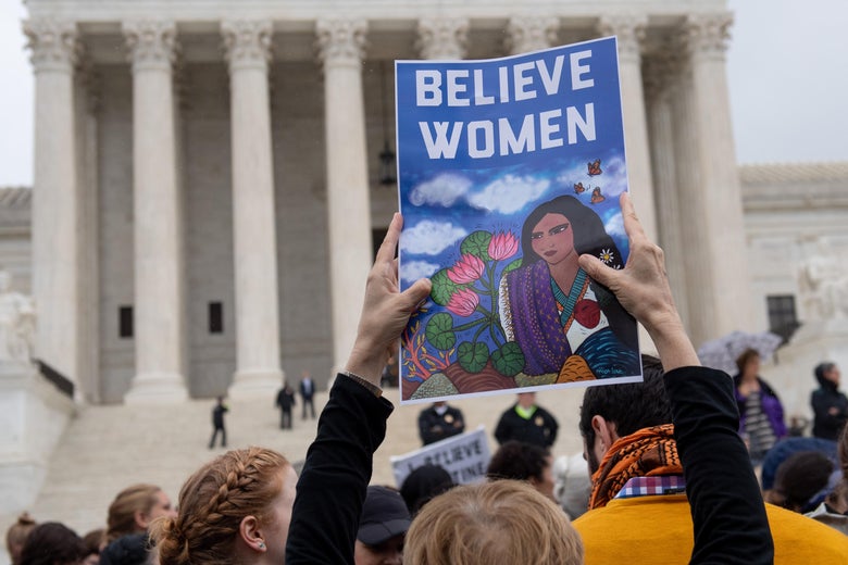 Demonstrators protest against the nomination of Judge Brett Kavanaugh to the Supreme Court.
