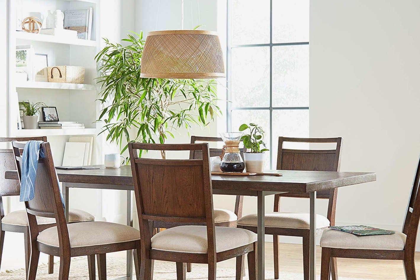 Table set in a dining room.