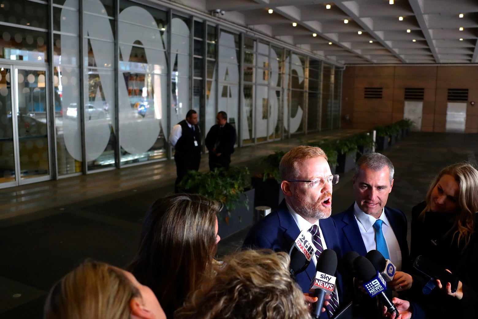 Craig McMurtrie, editorial director of the Australian Broadcasting Corporation, speaks to members of the media outside the ABC building.