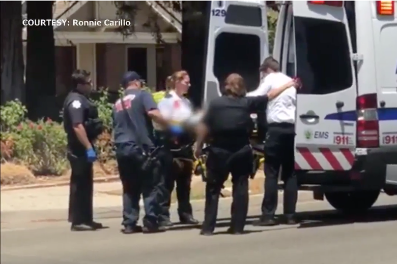Screenshot from a news report on local ABC affiliate KFSN show paramedics loading the two-year-old into an ambulance on July 8, 2018 in Fresno, California.