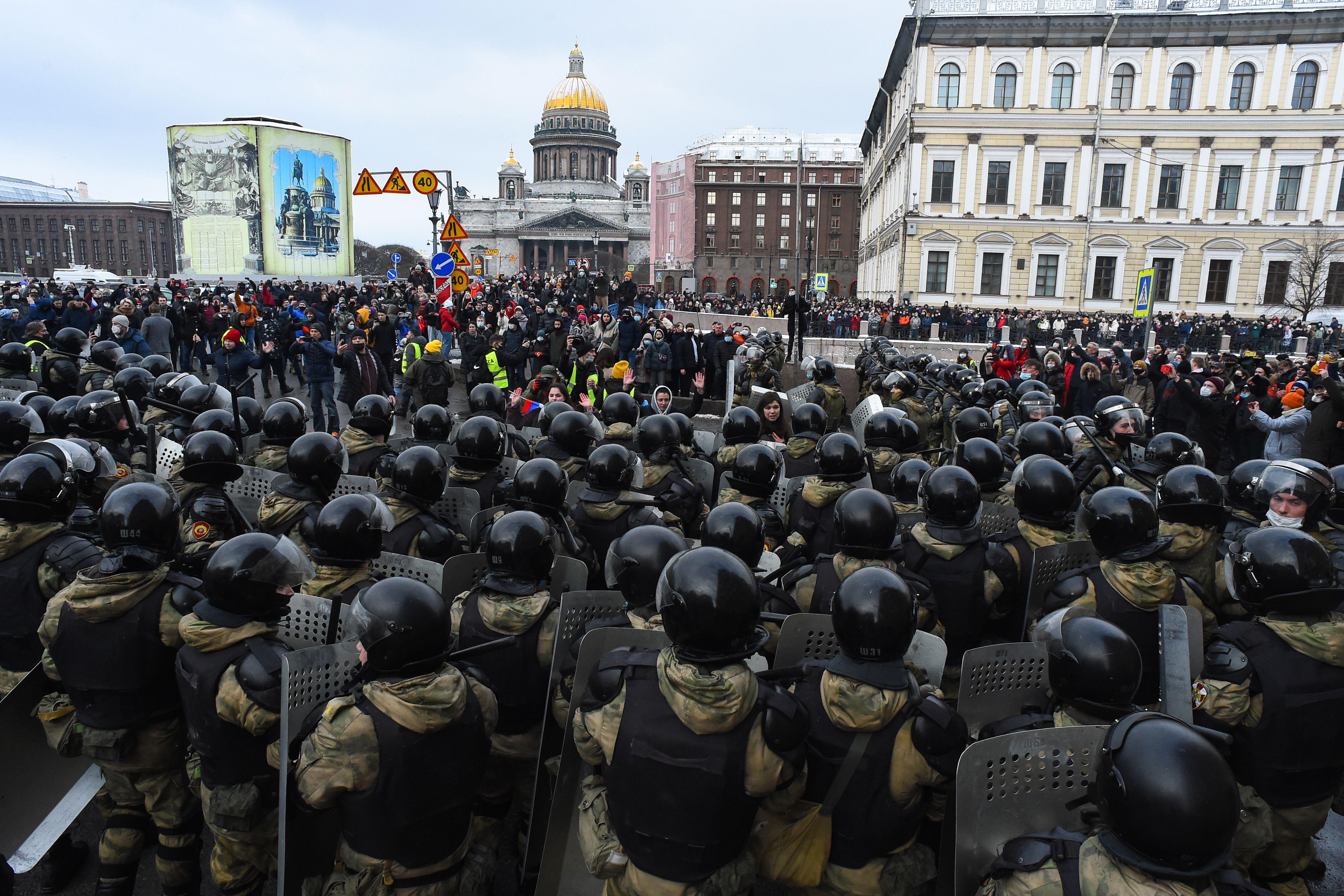 Law enforcement officers block protesters during a rally in support of jailed opposition leader Alexei Navalny in Saint Petersburg on January 31, 2021.