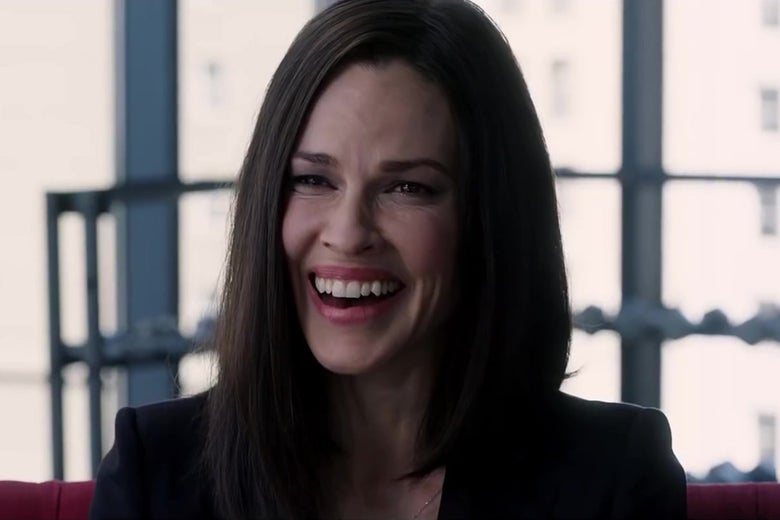 Hilary Swank, laughing.