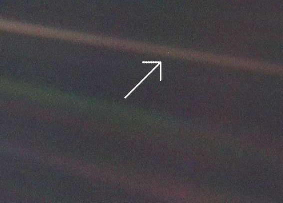 Earth, as seen from 6 billion kilometers away by Voyager 1.