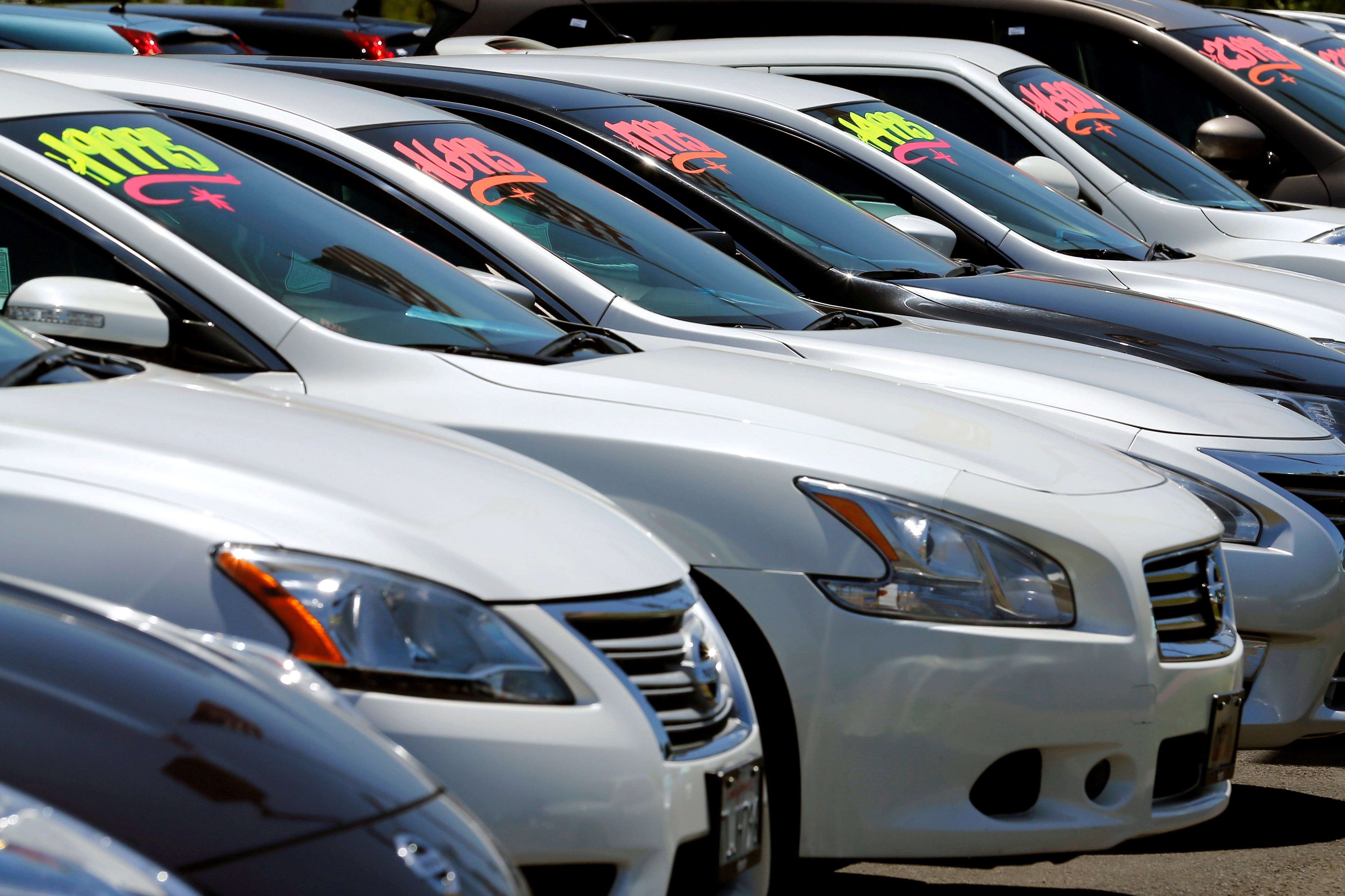 Automobiles are shown for sale at a car dealership in Carlsbad, California.