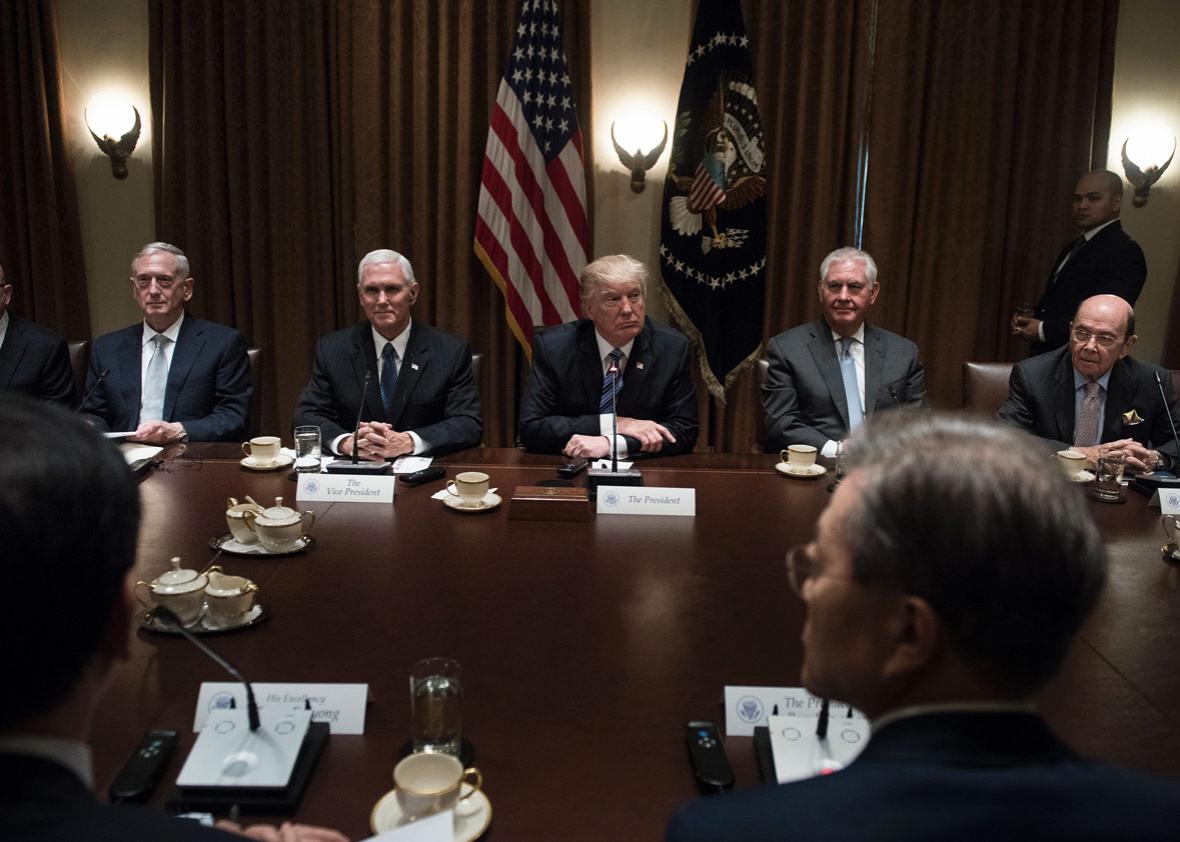 National Security Adviser H.R. McMaster, Secretary of Defense James Mattis, Vice President Mike Pence, President Donald Trump, Secretary of State Rex Tillerson, South Korea's President Moon Jae-in, and Secretary of Commerce Wilbur Ross wait for a meeting in the Cabinet Room of the White House on June 30.
