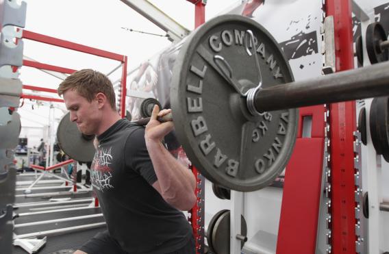 Chris Ashton lifts a barbell during the England training and weights session held at Pennyhill Park on July 20, 2011, in Bagshot, England.
