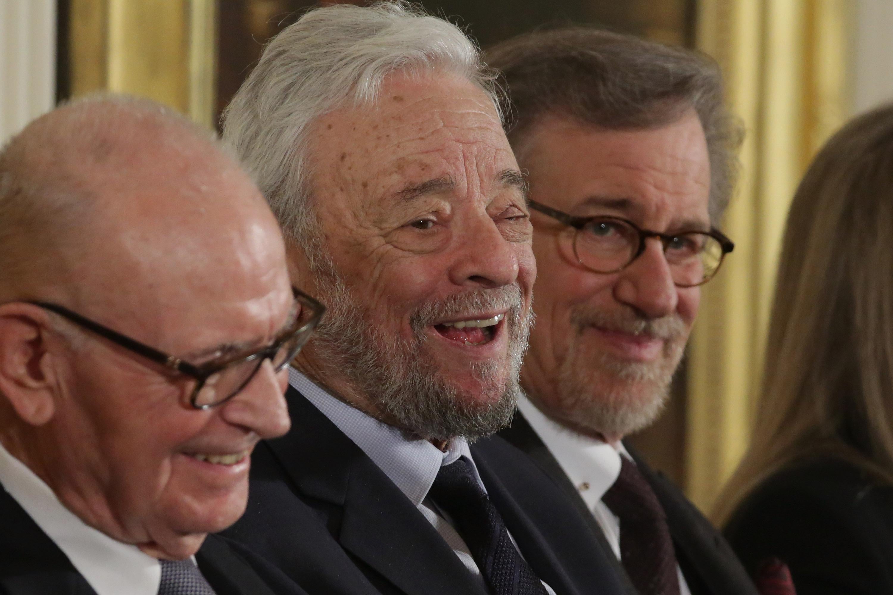 WASHINGTON, DC - NOVEMBER 24: (L-R) Former Rep. Lee Hamilton (D-IN), musical theater legend Stephen Sondheim and filmmaker Steven Spielberg attend a ceremony where they were presented with the Presidential Medal of Freedom in the East Room of the White House November 24, 2015 in Washington, DC. Obama presented the medal to thirteen living and four posthumous pioneers in science, sports, public service, human rights, politics and arts,  (Photo by Chip Somodevilla/Getty Images)
