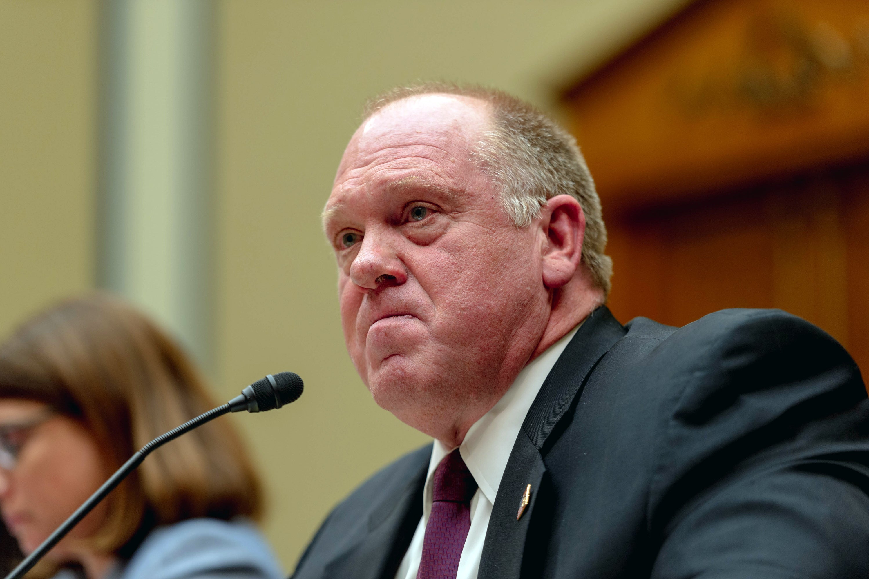 Thomas Homan at a microphone in a hearing room.