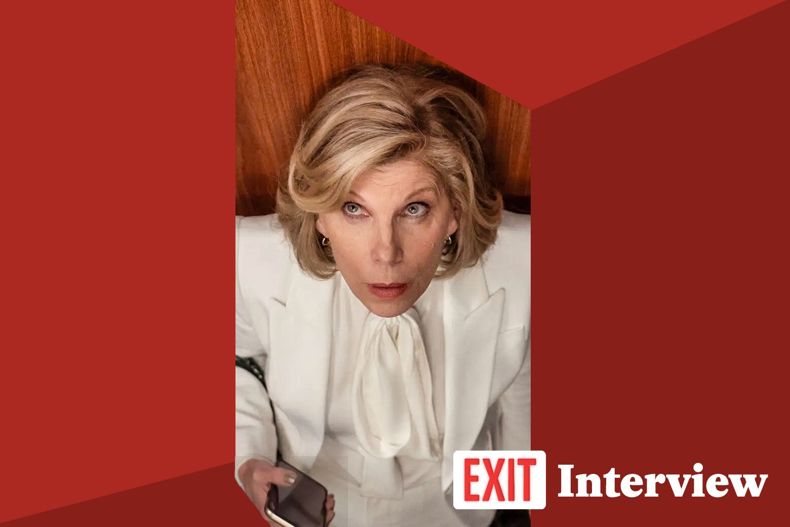 Christine Baranski seen through an opening in a red box, with a tearaway reading "Exit Interview" on bottom right