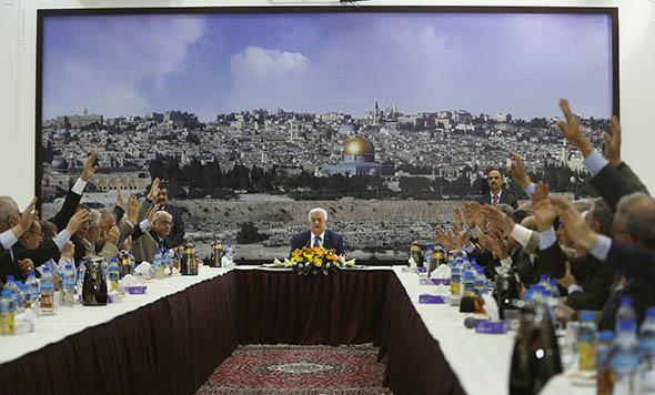 Palestinian leaders vote for international conventions as Palestinian president Mahmoud Abbas.