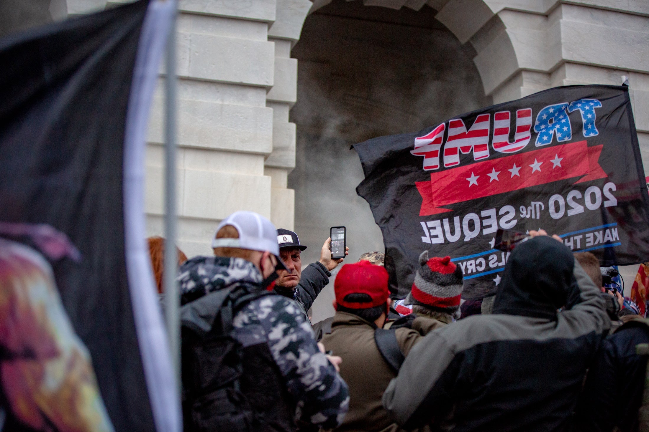 Rioters and tear gas outside the Capitol.